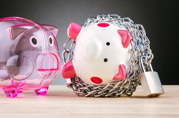 A close-up shot of a piggy bank overflowing with cash and coins, symbolizing savings and financial security.