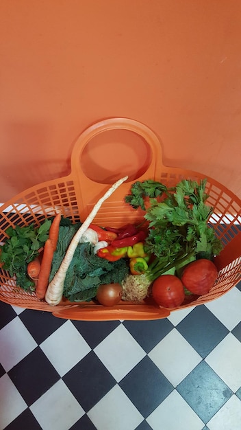A split image showing the same basket of groceries. One side shows the basket with prices from a year ago and the other side shows the basket with visibly higher prices today, illustrating the impact of inflation on everyday purchases.