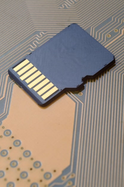 A detailed view of a NAND flash memory chip inside an SSD, showcasing the intricate layers and connections that allow for fast data storage and retrieval.